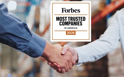 Handshake, agreement and teamwork for people in warehouse, meeting and deal for supply chain. Partnership, logistics and management shaking hands, distribution collaboration and courier company