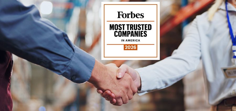 Handshake, agreement and teamwork for people in warehouse, meeting and deal for supply chain. Partnership, logistics and management shaking hands, distribution collaboration and courier company