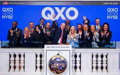 QXO executives, led by Brad Jacobs (center), ring the New York Stock Exchange opening bell on April 30, 2025, which also marked the closing of the company's acquisition of Beacon. (NYSE photo)