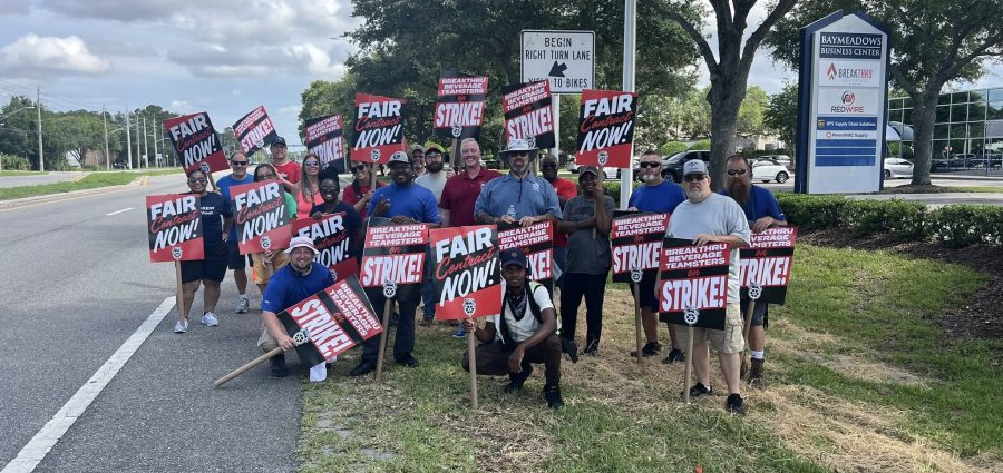 Teamsters Local 947 union members picket outside of a Breakthru Beverage facility in Jacksonville, FL on June 11. (Teamsters photo)”