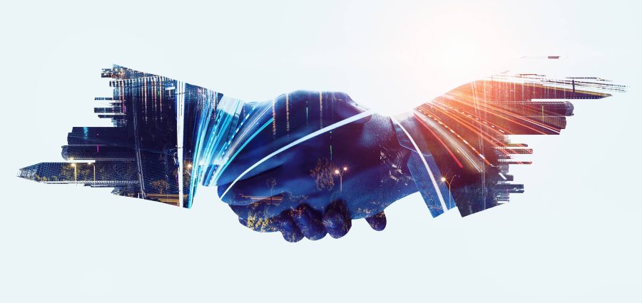 Double exposure of business partners shaking hands and modern cityscape