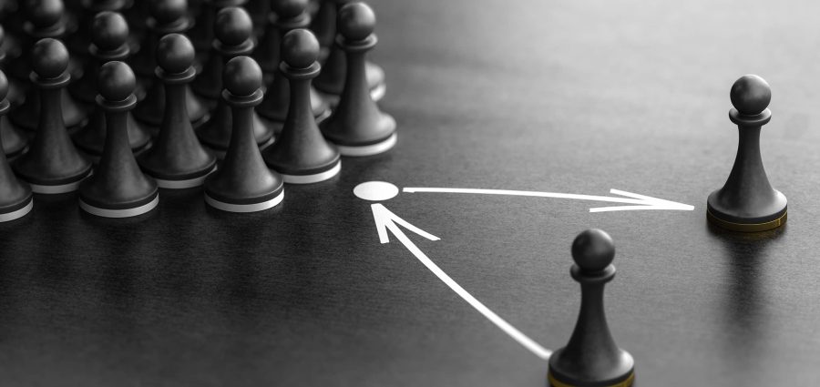 3d illustration of pawns over black background with one piece replaced by another one. Concept of succession planning and leader or senior manager replacement.