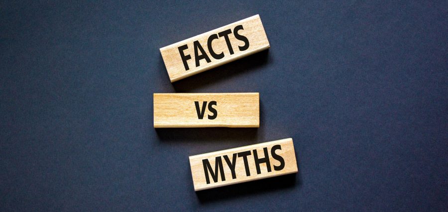 Facts vs myths symbol. Concept words Facts vs myths on wooden blocks on a beautiful black table black background. Business, finacial and facts vs myths concept. Copy space.