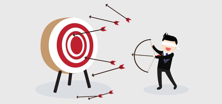Blindfold businessman try to hit a target