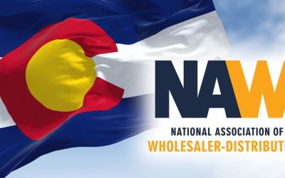 the flag of the US state of Colorado waving in the wind. Colorado is a state in the Mountain West subregion of the Western United States