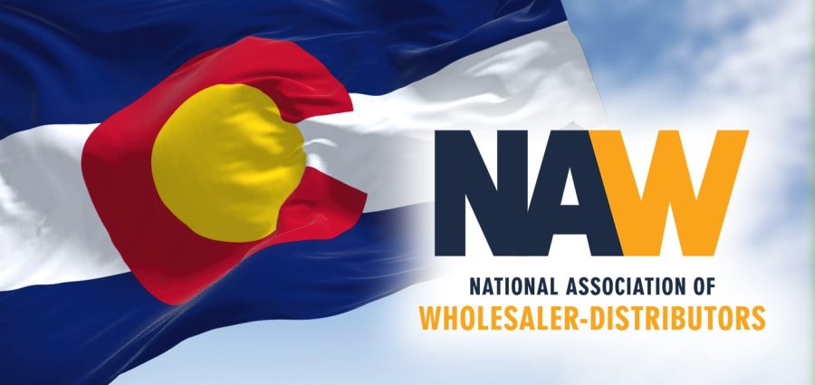 the flag of the US state of Colorado waving in the wind. Colorado is a state in the Mountain West subregion of the Western United States