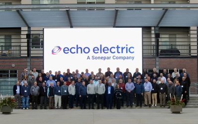 Echo Electric and Sonepar managers meet in Omaha, where they made the internal announcement to merge Midwest operations.