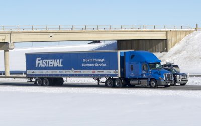 A Fastenal transport truck hauling cargo down a highway. Taken near Red Deer, Alberta. February 9, 2018