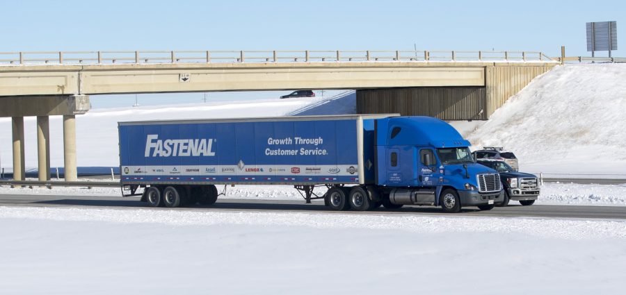 A Fastenal transport truck hauling cargo down a highway. Taken near Red Deer, Alberta. February 9, 2018