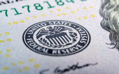Federal reserve system symbol on hundred dollar bill closeup macro shot
