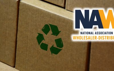 Recycling stamp printed on cardboard box. Recycle symbol, arrows, recyclable materials, environmental protection and earth safe concept.