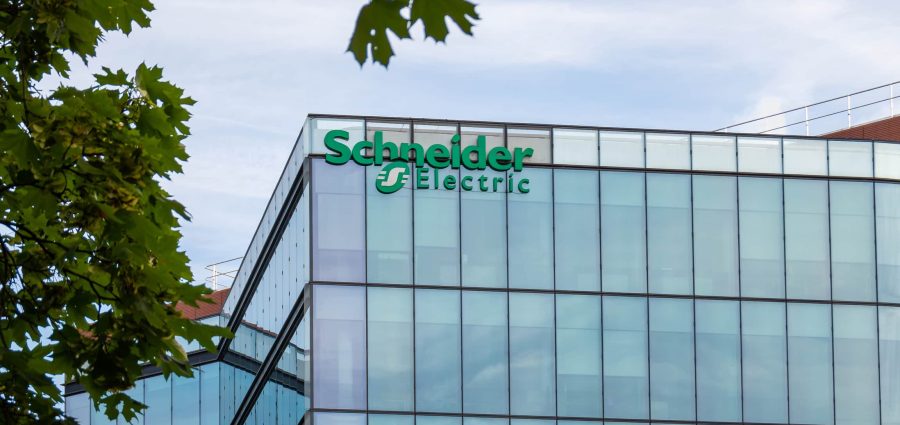 Rueil-Malmaison, France - August 13, 2023: Facade of the headquarters building of Schneider Electric, a French multinational company specializing in digital automation and energy management