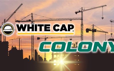 Vector with house building at sunset. Big Construction site with a tower cranes. Panoramic view of the construction site. Construction of business centers, shopping centers, residential buildings.