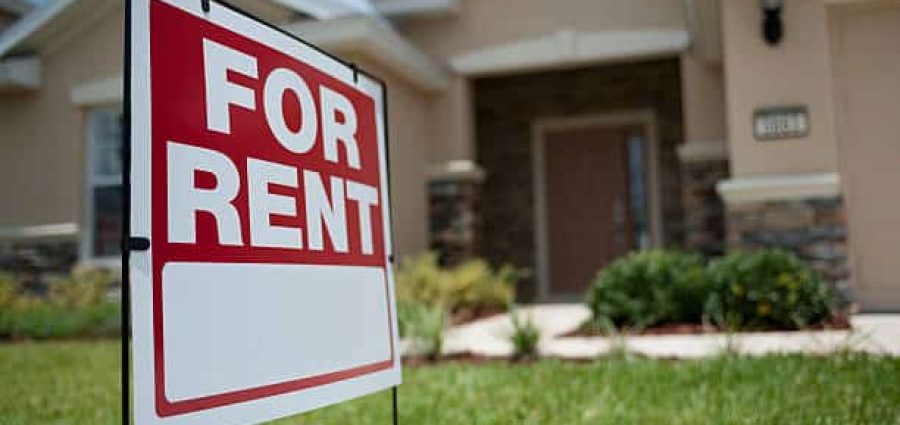 For Rent sign in front of new house