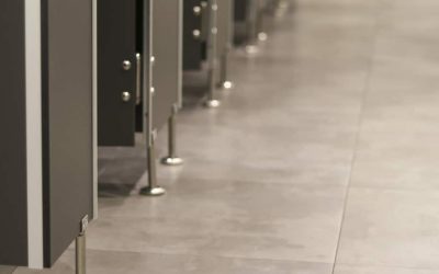 Public toilets that are partitioned into rooms.