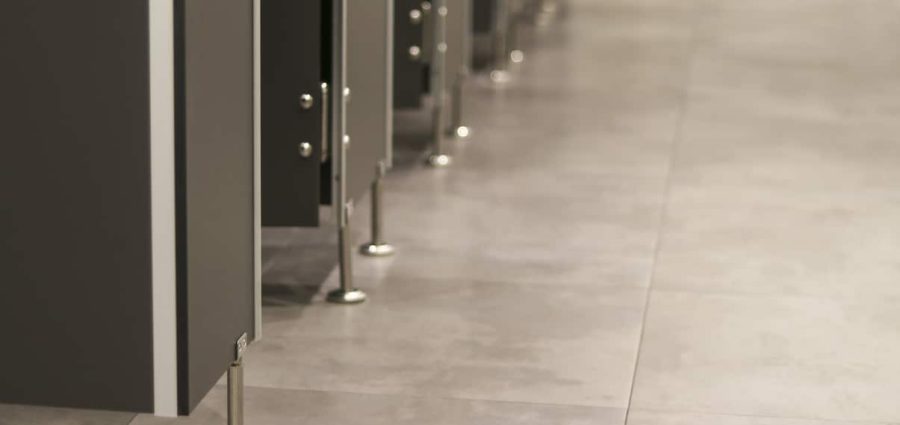 Public toilets that are partitioned into rooms.