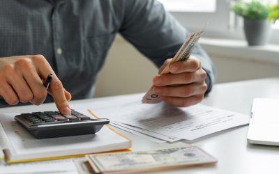 Man using calculator