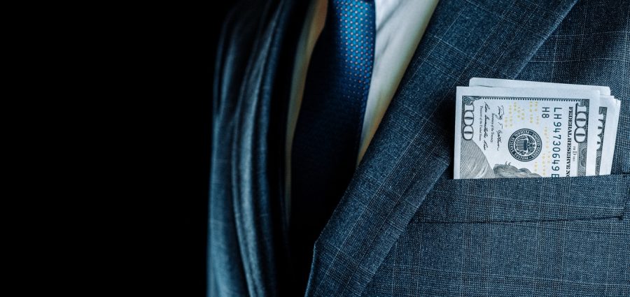 Dollar sign. Rich businessman holding american money. Cash usd bill background