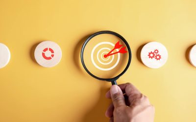 Magnifying glass focus to target icon which for planning development leadership and customer target group to success business corporate concept.