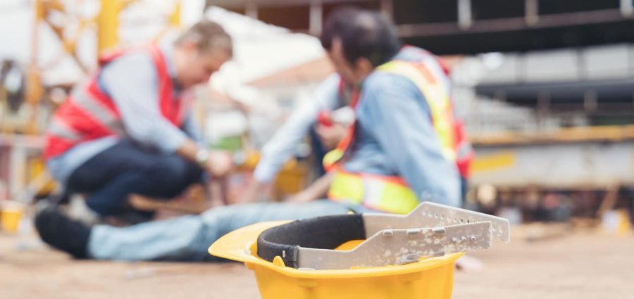 Construction builder worker accident at construction site. Industrial accident concept. Health safe of work and safety first concept