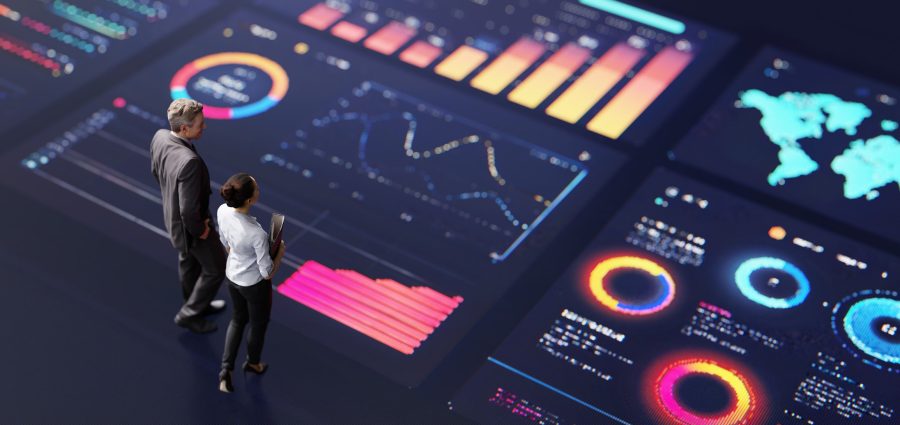 Abstract people standing on a large digital screen, analysing interactive data visualisations and charts for strategic planning. Representing teamwork, technology, and data-driven decision making in a corporate environment.