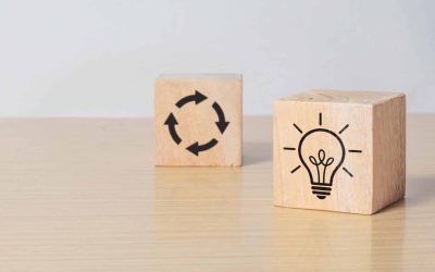 Wooden cube blocks with light bulb and cycle icons. Creative idea, solution and innovation concept. Idea generation for business development. clean background and copy space