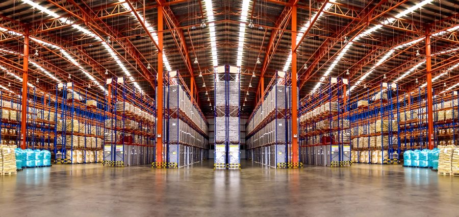 Warehouse industrial and logistics companies. Commercial warehouse. Huge distribution warehouse with high shelves. Bottom view.